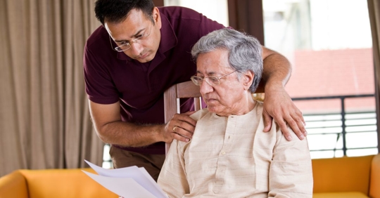 old man and son looking at will