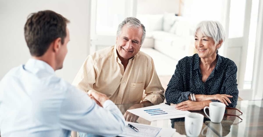 older couple talking to an attorney