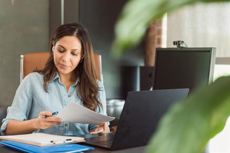 woman reviewing documents